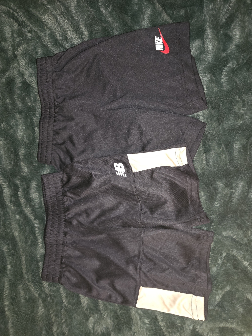 New Balance Kids Black Athletic Shorts with Light Tan Accent
